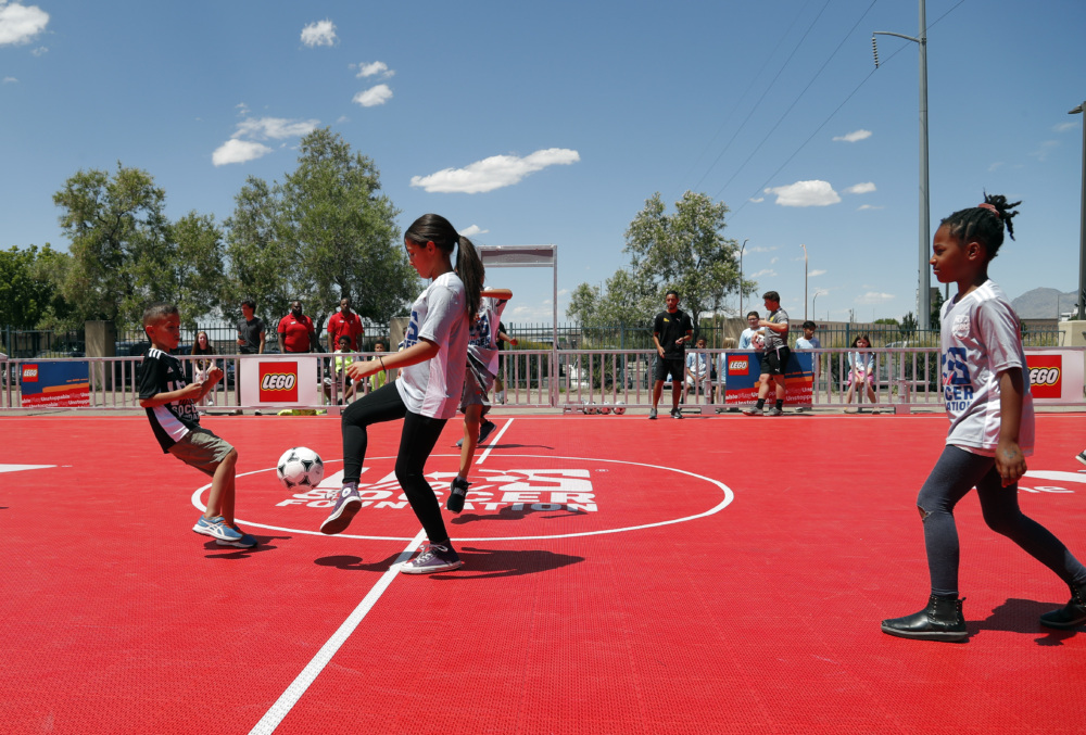 Kids play on the new LEGO mini-pitch in Albuquerque, NM